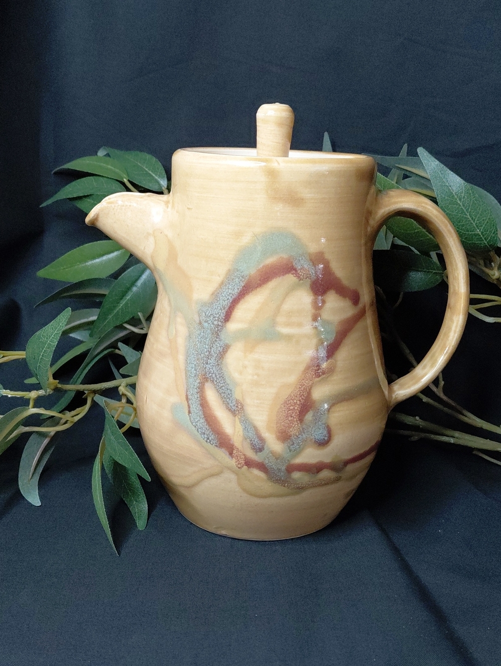 Handcrafted Ceramic Pitcher in Tan with Multicolor Glaze